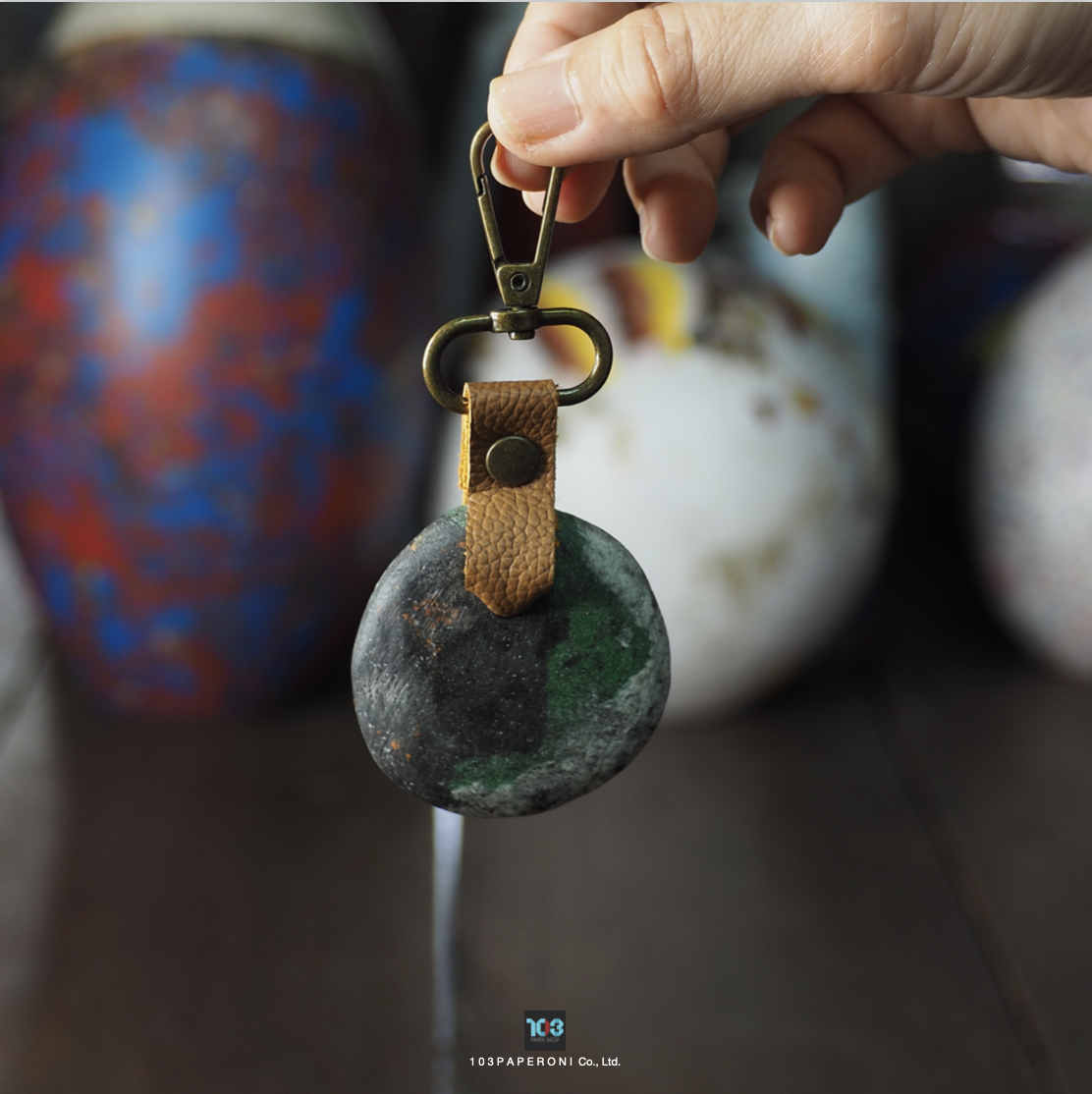 PAPER KEY CHAIN  :   Our designs give new life to recycled paper and other natural materials,  Handmade sculptures , Which is created piece by piece.