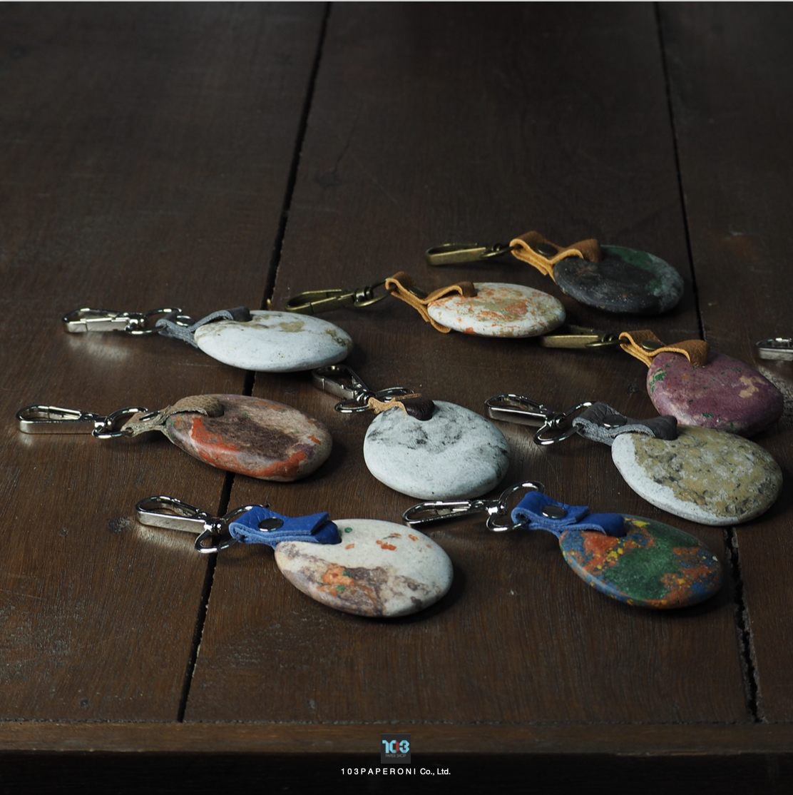 PAPER KEY CHAIN  :   Our designs give new life to recycled paper and other natural materials,  Handmade sculptures , Which is created piece by piece.