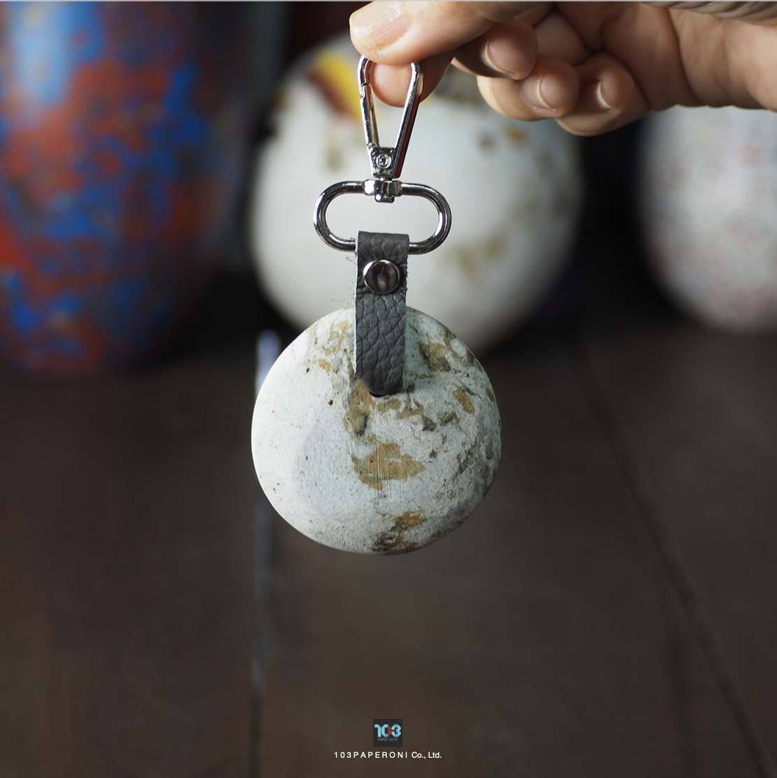 PAPER KEY CHAIN  :   Our designs give new life to recycled paper and other natural materials,  Handmade sculptures , Which is created piece by piece.