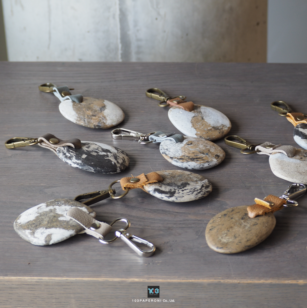 PAPER KEY CHAIN  :   Our designs give new life to recycled paper and other natural materials,  Handmade sculptures , Which is created piece by piece.