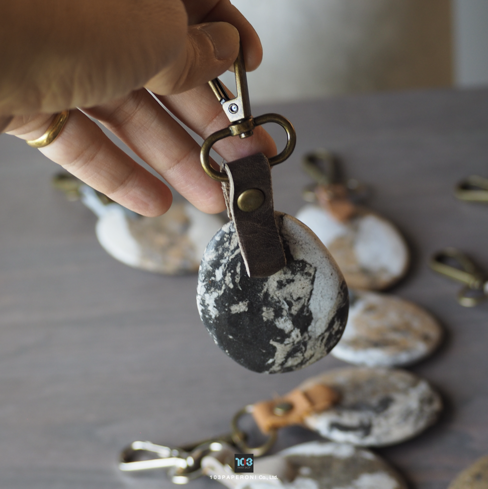 PAPER KEY CHAIN  :   Our designs give new life to recycled paper and other natural materials,  Handmade sculptures , Which is created piece by piece.