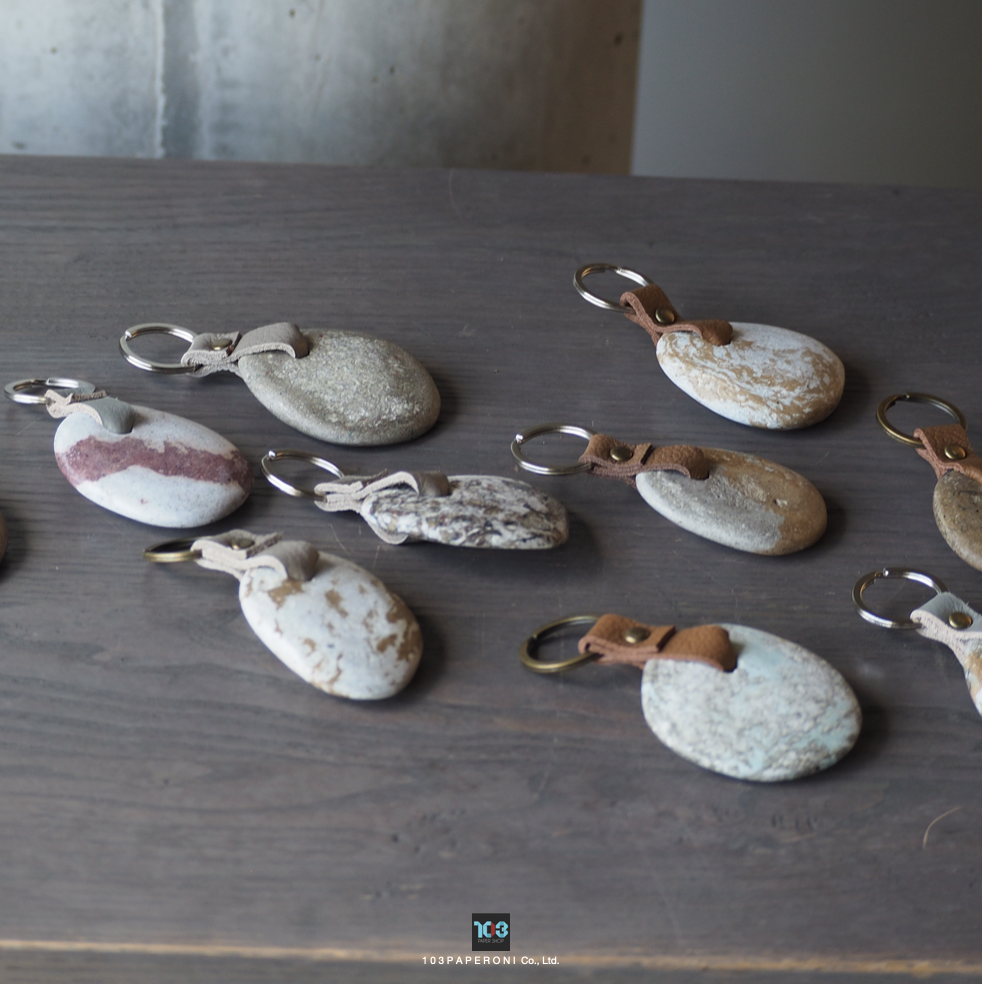 PAPER KEY CHAIN  :   Our designs give new life to recycled paper and other natural materials,  Handmade sculptures , Which is created piece by piece.