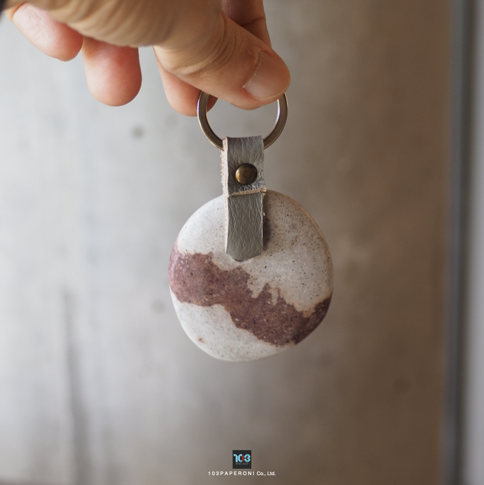 PAPER KEY CHAIN  :   Our designs give new life to recycled paper and other natural materials,  Handmade sculptures , Which is created piece by piece.