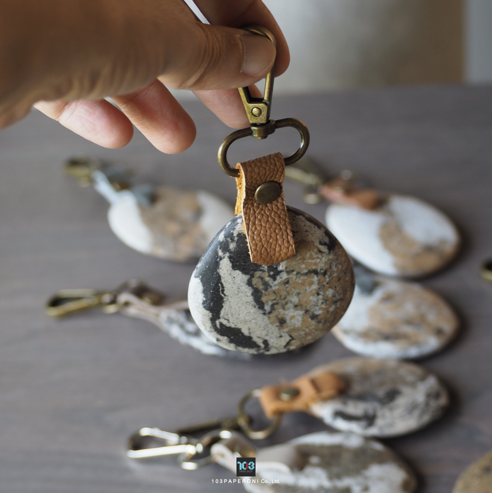 PAPER KEY CHAIN  :   Our designs give new life to recycled paper and other natural materials,  Handmade sculptures , Which is created piece by piece.